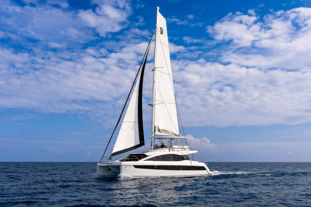 A50sail-exterior-running-sails-up-aquila50sail-fromchaserboat(67of67)